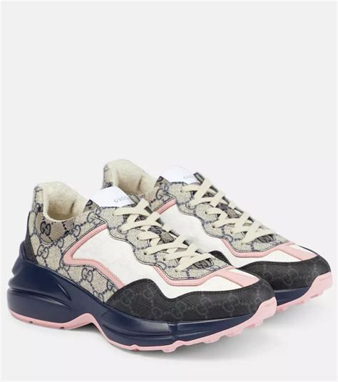 gucci gg canvas leather-trimmed sneakers|Gucci gg low top sneakers.